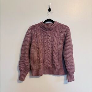 A new day cable knit chunky sweater in pretty pink size small. Has some piling u